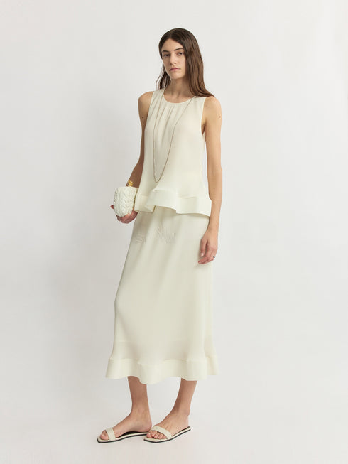 Miyake-Inspired Pleated Petal Sleeveless Top & Midi Skirt Set – Vanilla Cream Sculptural Ensemble