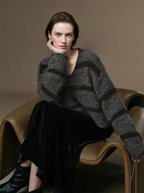 Soft Wool V-Neck Striped Sweater with Colorful Pom Details and Subtle Sequins | Relaxed Winter Knitwear