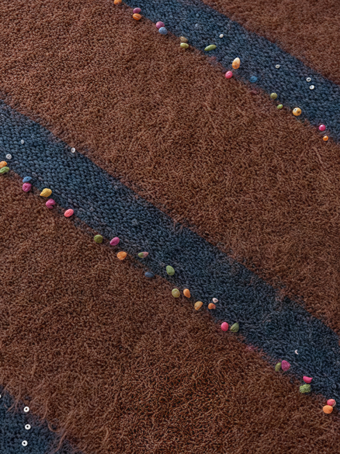 Soft Wool V-Neck Striped Sweater with Colorful Pom Details and Subtle Sequins | Relaxed Winter Knitwear