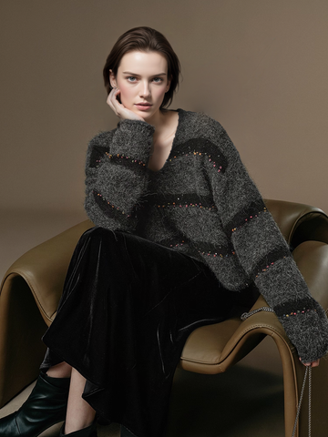 Soft Wool V-Neck Striped Sweater with Colorful Pom Details and Subtle Sequins | Relaxed Winter Knitwear