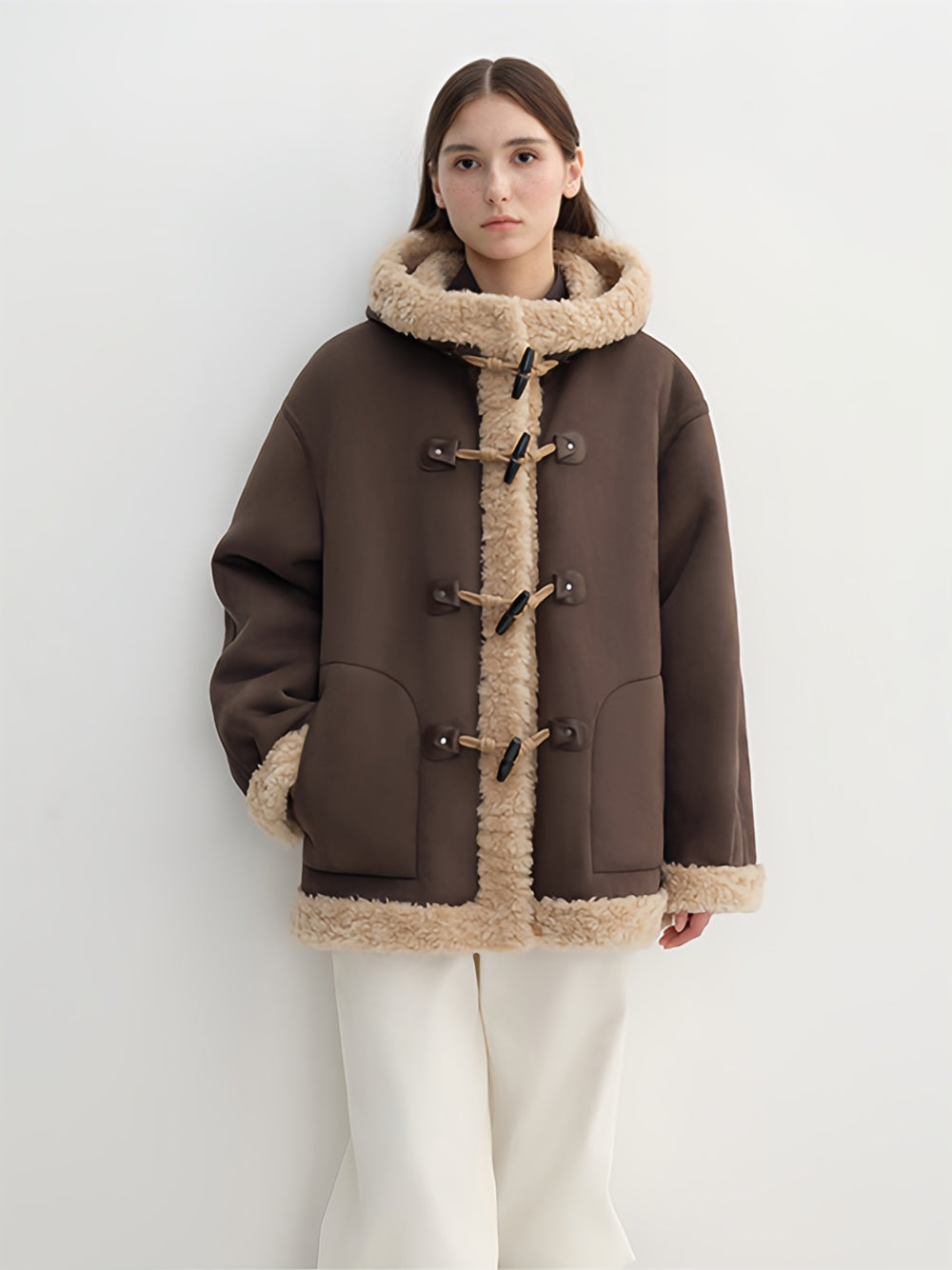 Color-Contrast Shearling Hooded Coat for Women — Mid-Length Faux Sheepskin Jacket with Raw-Edge Trim