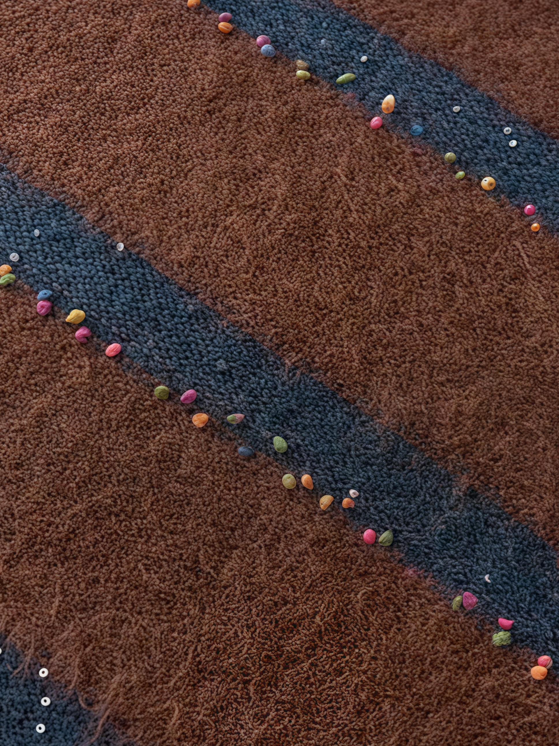 Soft Wool V-Neck Striped Sweater with Colorful Pom Details and Subtle Sequins | Relaxed Winter Knitwear